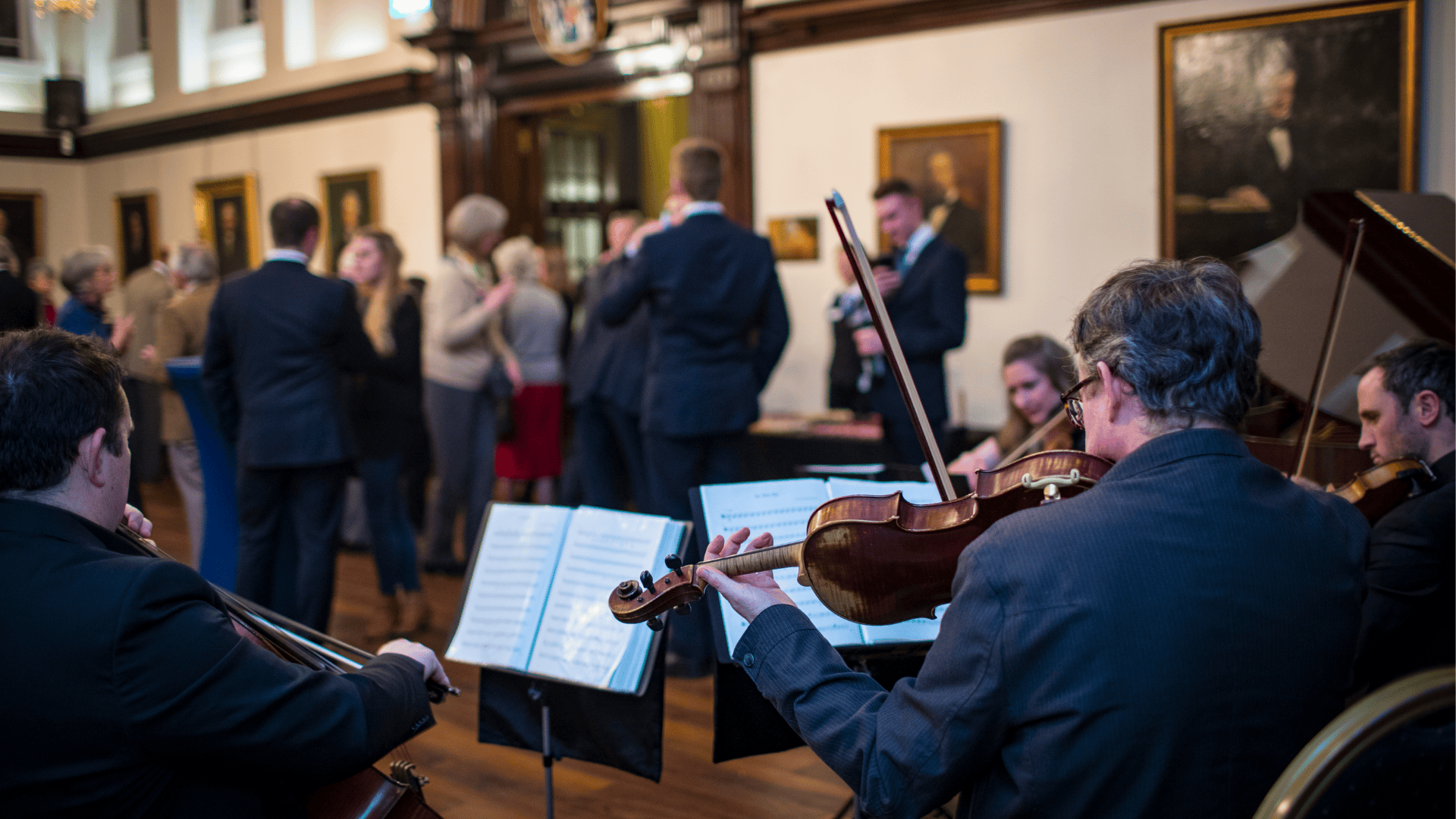 Musicians playing in College hall